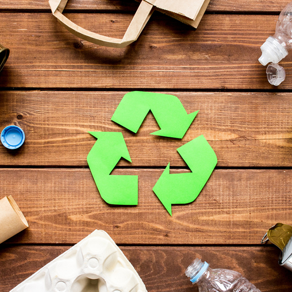 Eco,Concept,With,Recycling,Symbol,On,Table,Background,Top,View