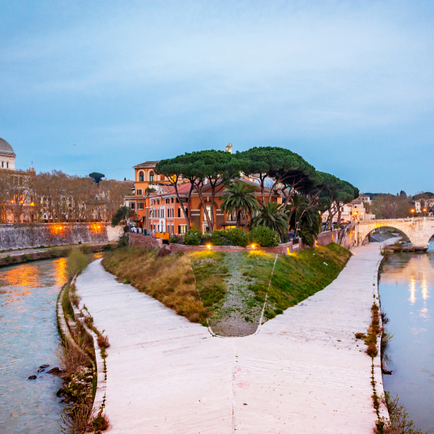 The historical Tiber island from the Garibaldi Bridge in Rome.