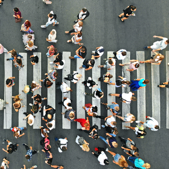 Aerial.,People,Crowd,On,Pedestrian,Crosswalk.,Top,View,Background.